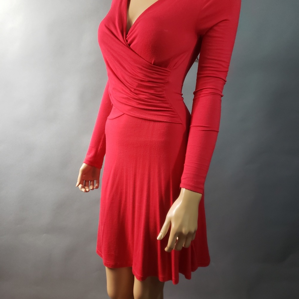 Charlotte Russe Small dress. Crisscross front, long sleeves stretch pullover